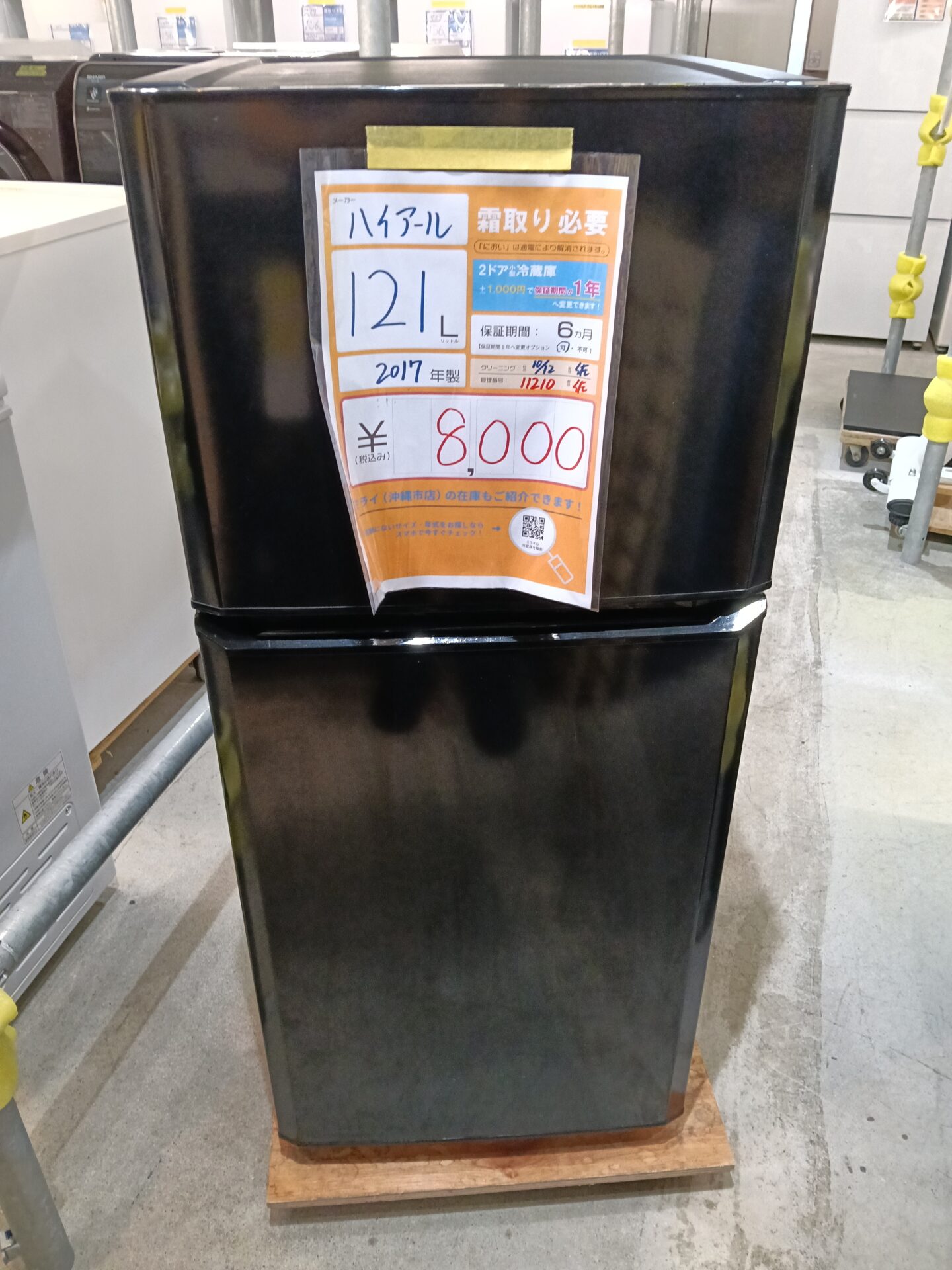 11210