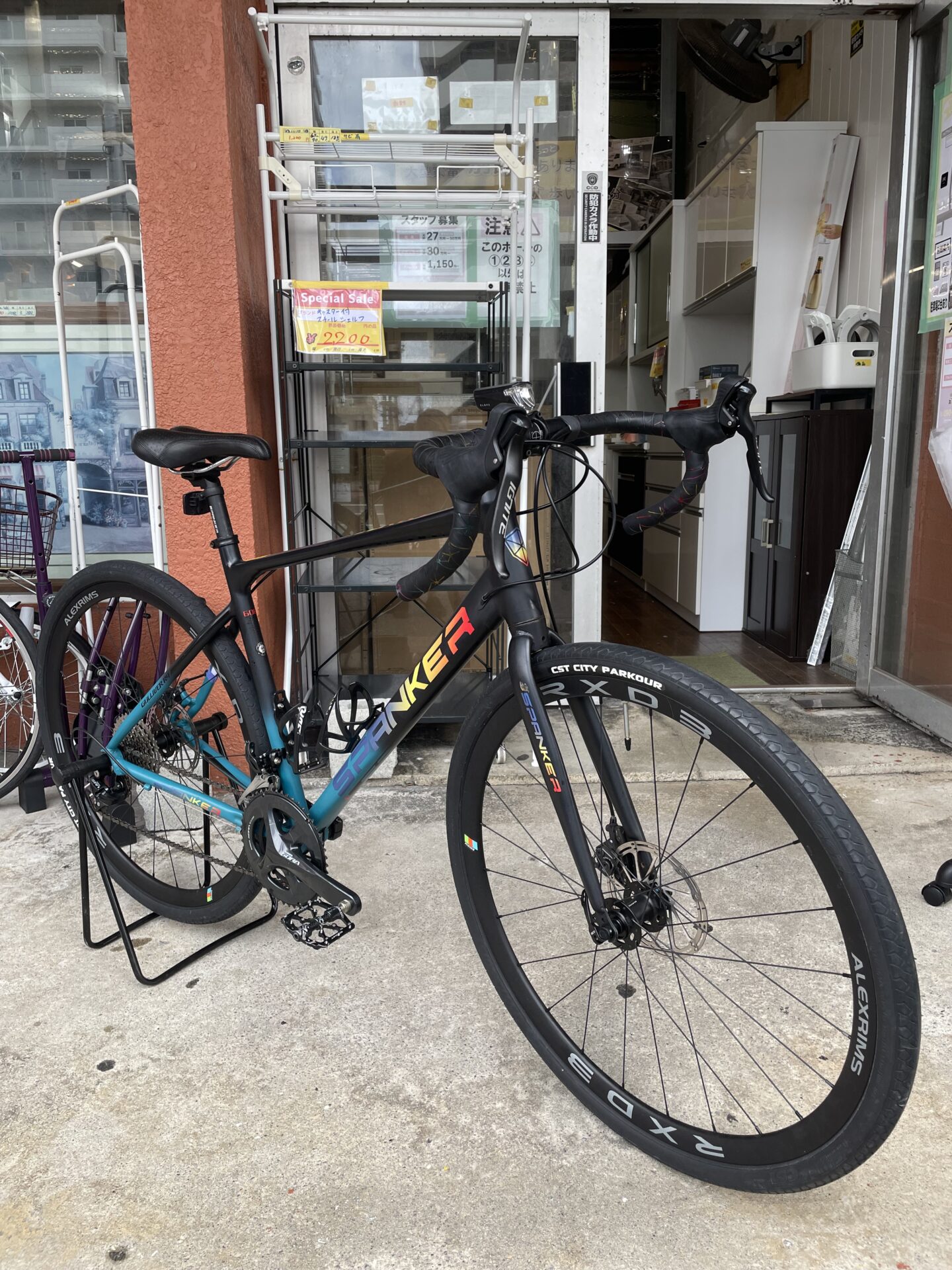 11210